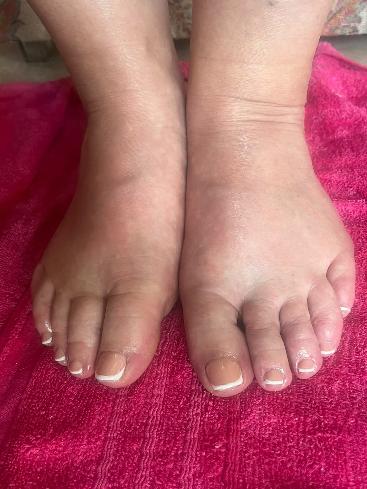 Classic French pedicure with clean white tips